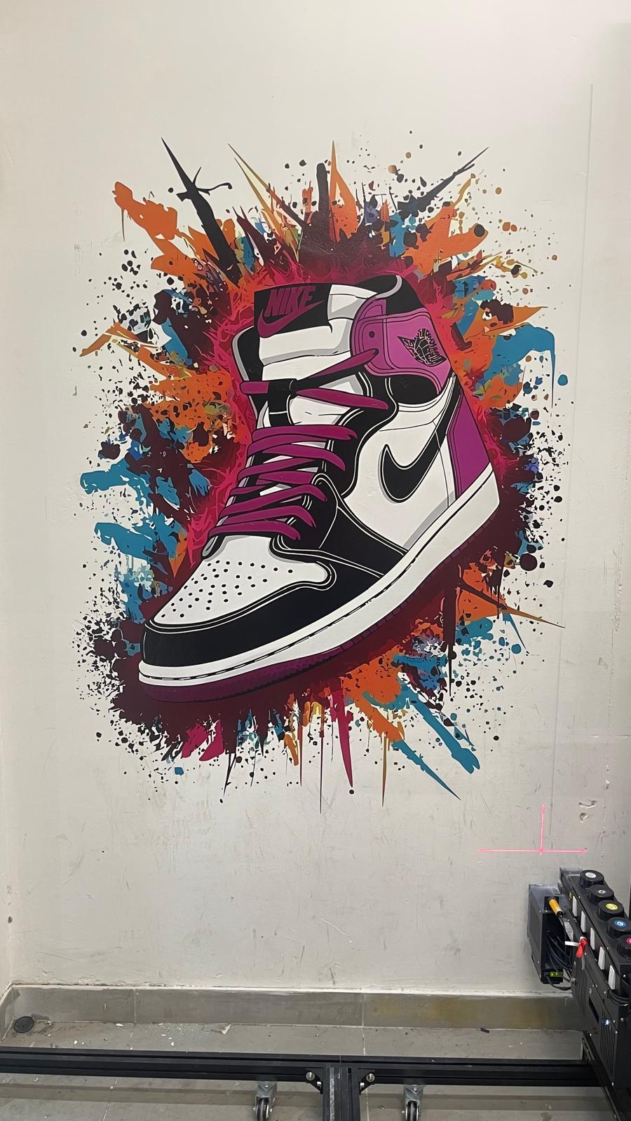 Colorful Nike Air Jordan sneaker mural with paint splash background